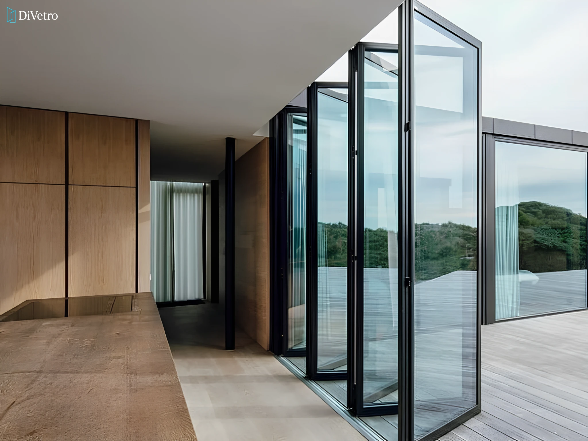 Folding glass door system connecting indoor living space to outdoor patio — real project