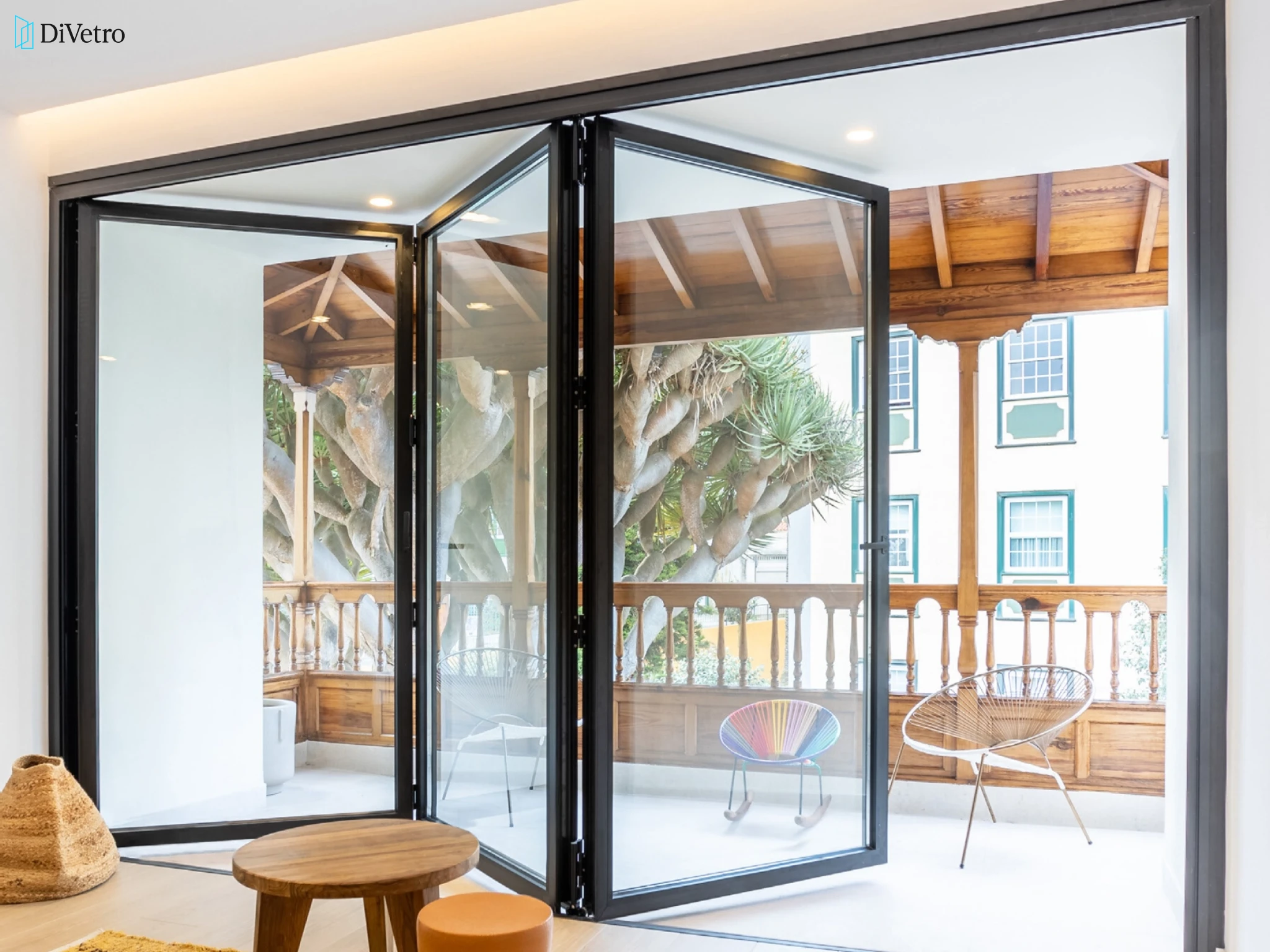 Panoramic bi-fold glass door system on a modern home providing unobstructed view