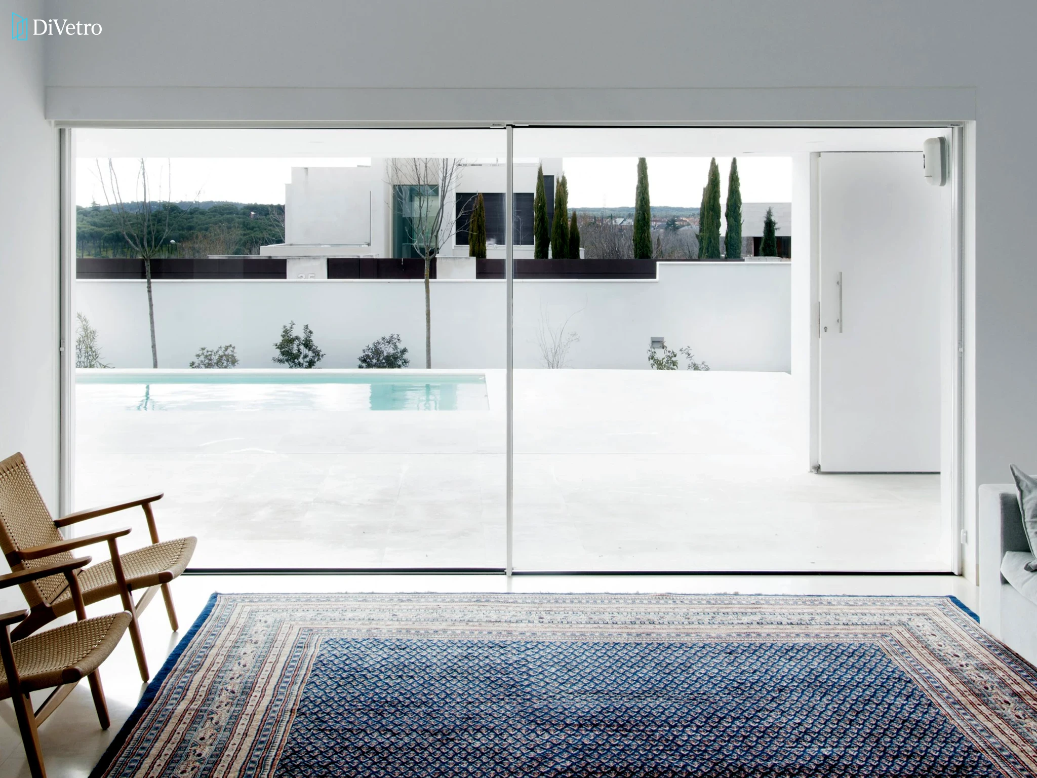 CorVision ultra-slim aluminum sliding door system installed at a luxury residence — real project