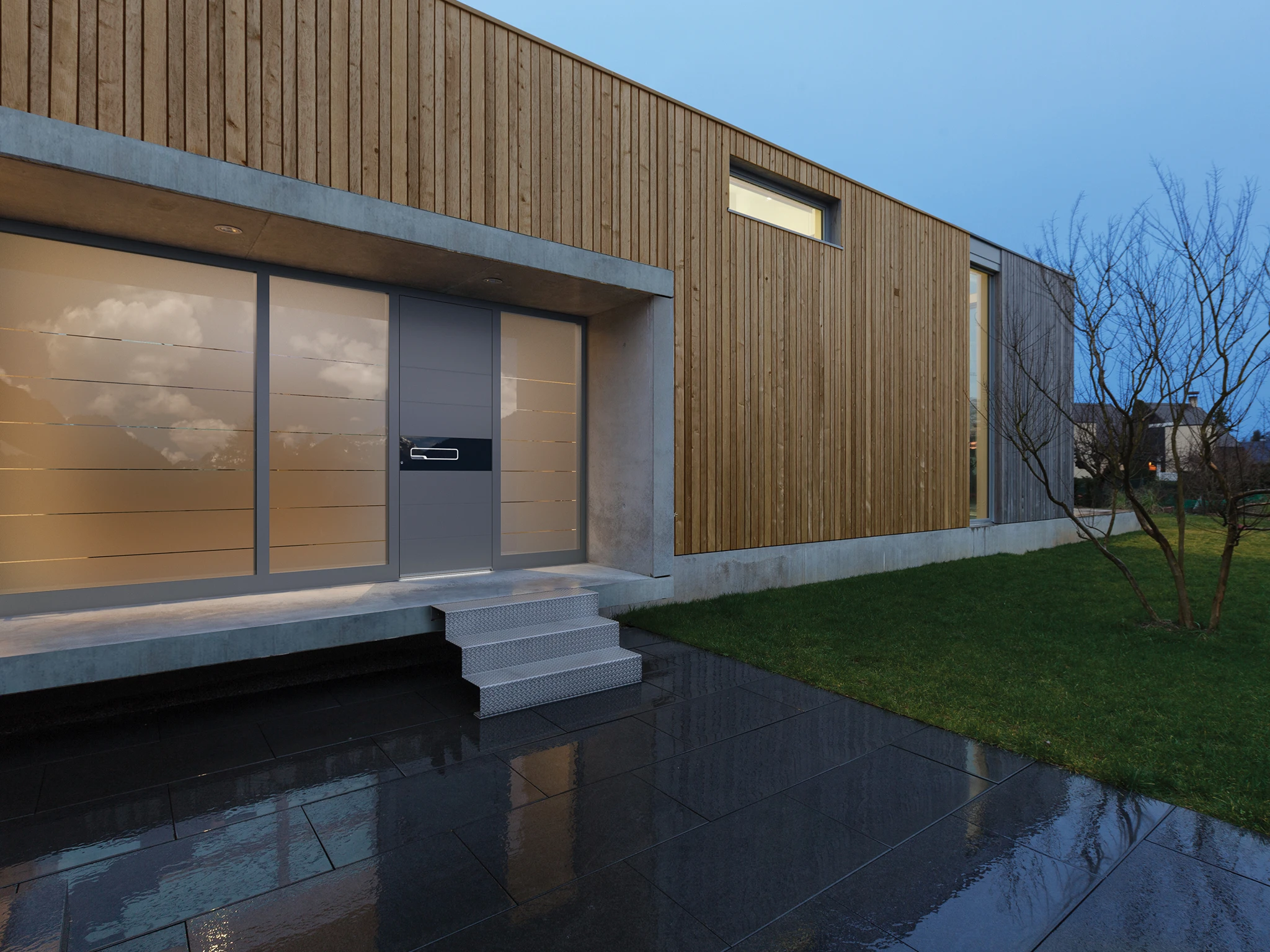 Pirnar front door with sidelight glazing on a contemporary home — real project